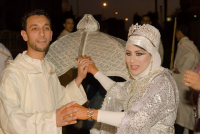 Moroccan newly married couple at the wedding dance.