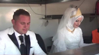 Turkish bride and groom serve guests on their wedding day.