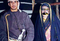 An Emirati wedding with the newly married couple in traditional bridal attire